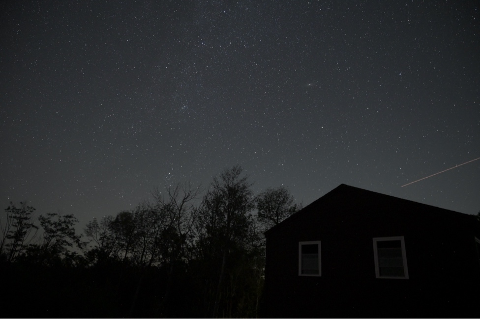 Night sky behind house